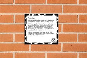 LVN-Stationsschild auf Mauerwand